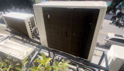 广东一女子家里太热,发现阳台外被挂了12台空调外机